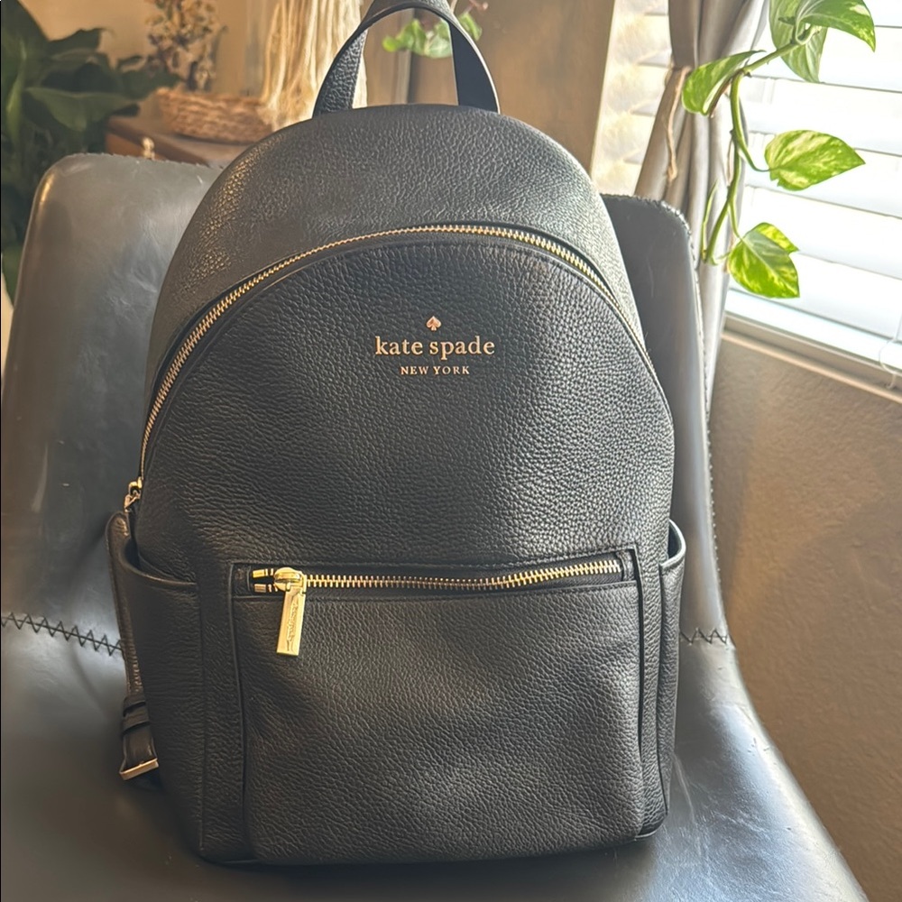 kate spade Black Pebbled Leather Mini Backpack with Gold Accents